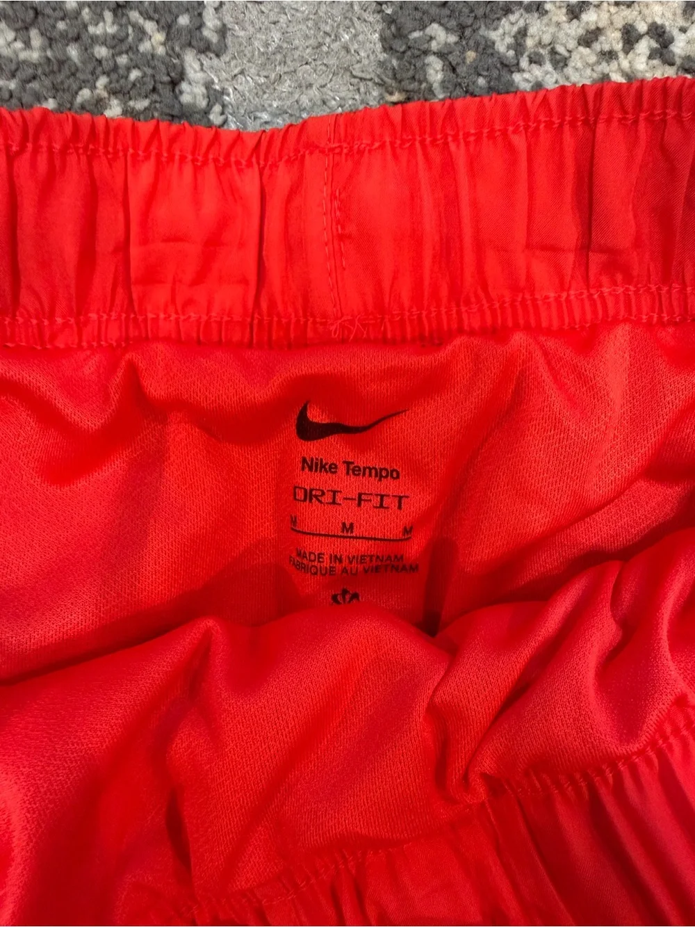 Nike Women’s Red Athletic Running Shorts with White Swoosh